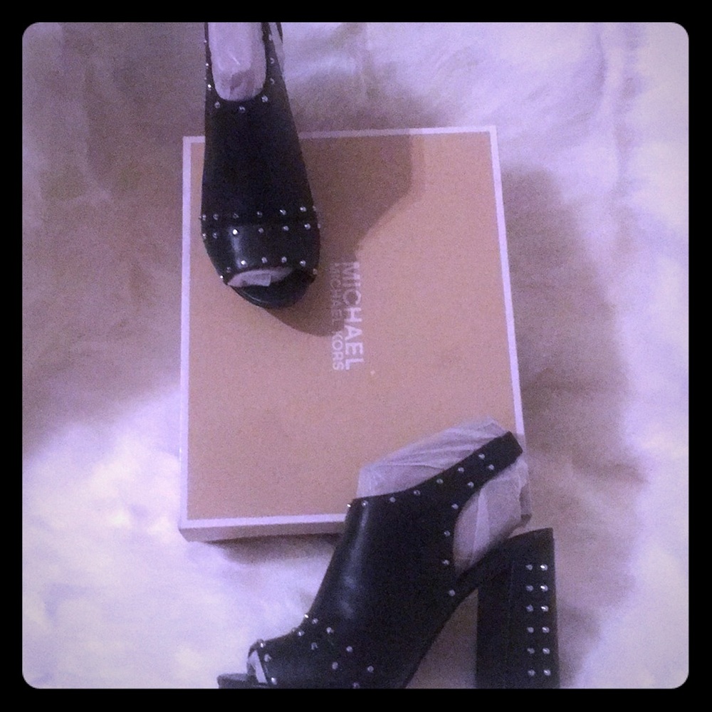 Michael Kors heels with silver studs.